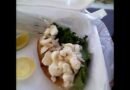 Seaside Beach Florida having a Lobster Roll for breakfast on the ocean